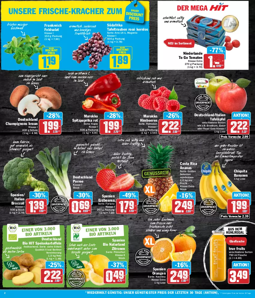 Aktueller Prospekt Hit - Wochenprospekt - von 29.01 bis 03.02.2024 - strona 2 - produkty: ananas, auer, aus dem kühlregal, banane, bananen, beere, beeren, berliner, bio, bio hit, braun, broccoli, champignon, champignons, champignons braun, chiquita, discount, eintopf, eis, erdbeere, erdbeeren, feldsalat, flasche, fleisch, frucht, fruchtfleisch, glasflasche, himbeer, himbeere, himbeeren, kartoffel, kartoffeln, kracher, kühlregal, LG, mac, natur, naturland, navelina, nudel, Nudelgericht, nuss, obst, orange, orangen, paprika, paprika rot, regal, reis, saft, salat, Schal, Schale, snack, speisekartoffeln, Spitzpaprika, tafeläpfel, tafeltrauben, Ti, tisch, tomate, tomaten, topf, trauben, true fruits, vita, Vitamin C, zitrone, zitronen, ZTE, zucker