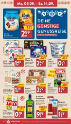 Gazetka promocyjna Aldi Nord - Von Montag - Gazetka - ważna od 14.09 do 14.09.2024 - strona 10 - produkty: aufstrich, aus der tiefkühlung, Becher, Becherovka, beutel, bier, blume, blumen, brot, brotaufstrich, dovgan, eis, flasche, getränk, gin, hero, kabanos, kräuter, kuchen, Lakritz, mac, nuss, quark, Quarki, radler, reis, sahne, Schal, Schale, snack, snacks, Ti, tyskie, Waffelröllchen, ZTE