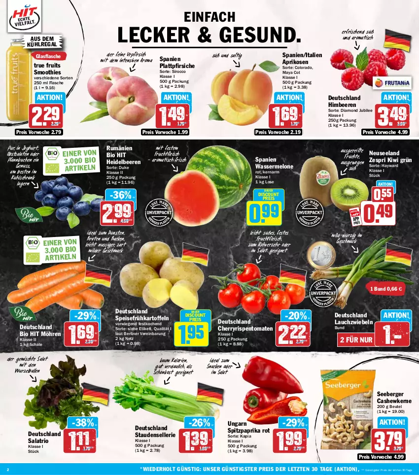 Aktueller Prospekt Hit - Wochenprospekt - von 14.07 bis 19.07.2025 - strona 2 - produkty: aprikose, aprikosen, auer, aus dem kühlregal, ball, beere, beeren, Berger, berliner, beutel, bio, bio hit, braten, Cashew, cashewkerne, discount, eis, Elan, elle, flasche, fleisch, frucht, früchte, fruchtfleisch, Frühkartoffeln, glasflasche, heidelbeere, heidelbeeren, himbeer, himbeere, himbeeren, joghur, joghurt, kartoffel, kartoffeln, kiwi, kuchen, kühlregal, kühlschrank, Lauchzwiebel, lauchzwiebeln, mac, melone, möhren, nuss, obst, paprika, paprika rot, Pfannkuchen, pfirsich, pfirsiche, plattpfirsiche, regal, reis, rispentomaten, rum, saft, salat, salate, Schal, Schale, Schrank, seeberger, smoothie, smoothies, snack, speisefrühkartoffeln, Spitzpaprika, stauden, Ti, tisch, tomate, tomaten, true fruits, wasser, wassermelone, zespri, ZTE, zwiebel, zwiebeln
